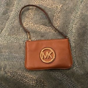Like new Michael Kors wristlet with logo